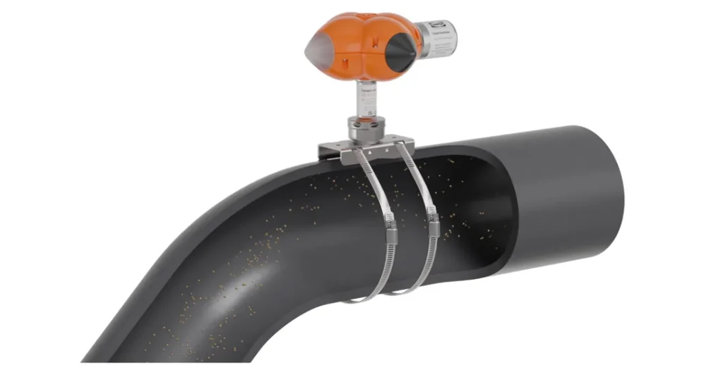 ClampOn BIRD wireless sand monitor clamped after a pipe bend